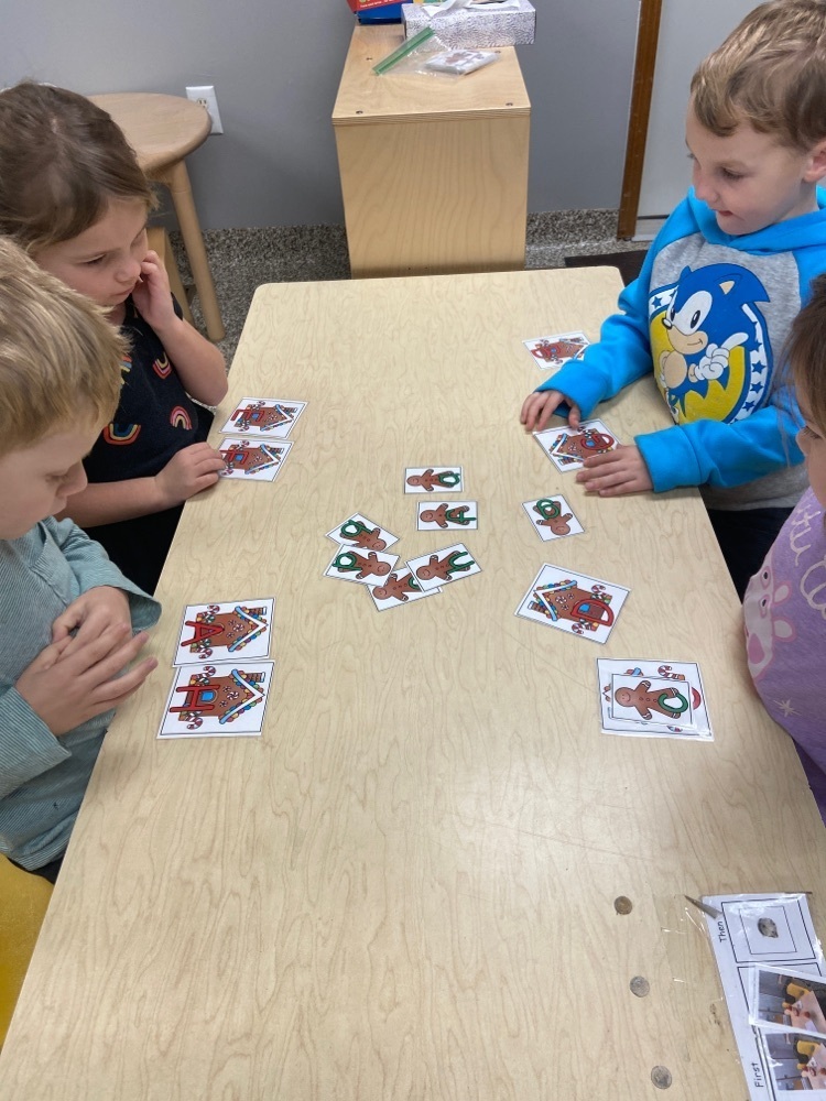 Preschool class are having fun with the gingerbread man theme. Today they are working on letter recognition and matching with gingerbread houses with a capital letter and saying and matching the lower case letter. 